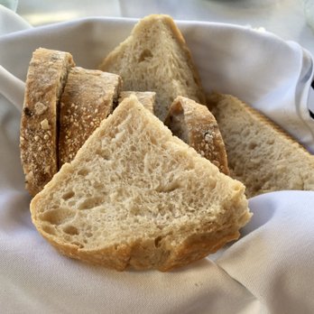 Summit House - Sourdough and multigrain bread basket - Steakhouses Near Me - Fullerton, California Summit House - Sourdough and multigrain bread basket - Steakhouses Near Me - Fullerton, California