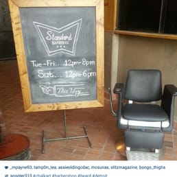 The chalk art sign at the entrance to the Standard Barber Co. in Detroit. The chalk art sign at the entrance to the Standard Barber Co. in Detroit.