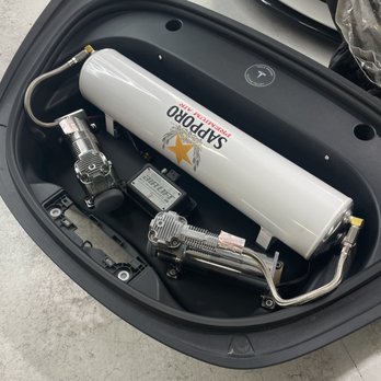 Carmodz - After reworking my frunk setup's air system. I wanted the drain to face down, which made the wrap become upside down but, I can rewrap it. - Vehicle Wraps Near Me - Santa Clara, California