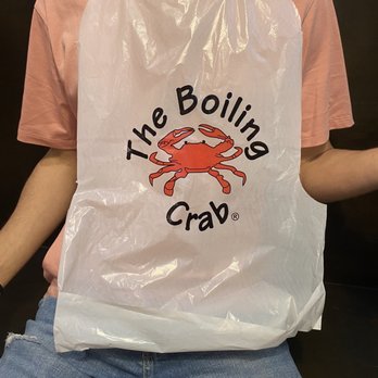 The Boiling Crab - The official Boiling Crab bib - Seafood Near Me - Cambridge, Massachusetts The Boiling Crab - The official Boiling Crab bib - Seafood Near Me - Cambridge, Massachusetts