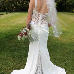 Jeannie's Stitchery - Kellys wedding gown that she created the bustle, she hemmed it up, put cups in.... jeannie and her partner did an amazing job!
