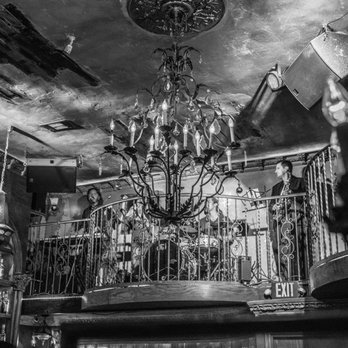 La Descarga - a black and white photo of a chandelier - Lounges Near Me - Hollywood, California La Descarga - a black and white photo of a chandelier - Lounges Near Me - Hollywood, California