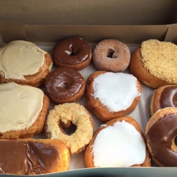 a variety of donuts in a box