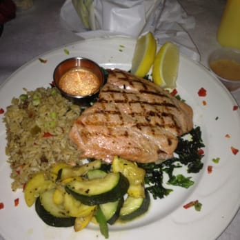 Bourbon Street - Grilled Salmon w/ rice and fried spinach - Cajun/Creole Near Me - Bayside, New York
