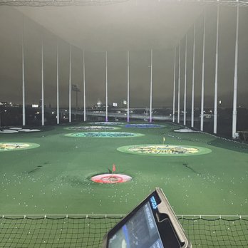 Topgolf - Aim for the different holes for points.  I like to hit the back net. - Golf Near Me - Baltimore, Maryland