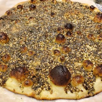 Sayad Mediterranean Kitchen - a flat bread pizza - Mediterranean Near Me - Houston, Texas Sayad Mediterranean Kitchen - a flat bread pizza - Mediterranean Near Me - Houston, Texas