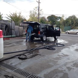 3 guys cleaning the interior.