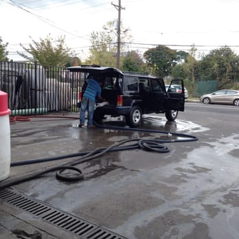 Flores Car Wash - 3 guys cleaning the interior. - Car Wash Near Me - Jersey City, New Jersey