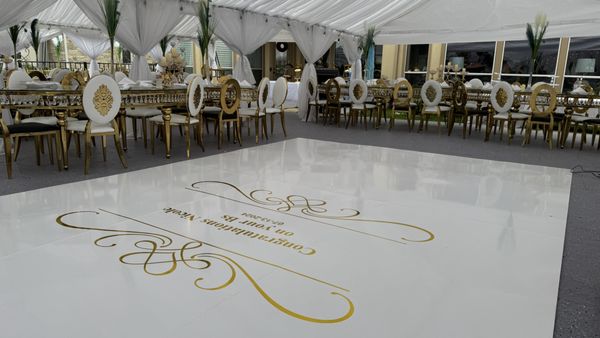 Vinyl Dance Floors and Monograms - Our custom monogram designs paired with the right colored vinyl dance floors create an elegant and memorable setting for your event. Contact us to book your event today!!