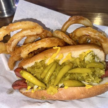 Pickwick Pub - Chicago Dog minus tomato, with extra sport peppers. Side of onion rings. - Pubs Near Me - Woodland Hills, California Pickwick Pub - Chicago Dog minus tomato, with extra sport peppers. Side of onion rings. - Pubs Near Me - Woodland Hills, California