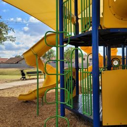 Yellow slide playground, the ladder of death.