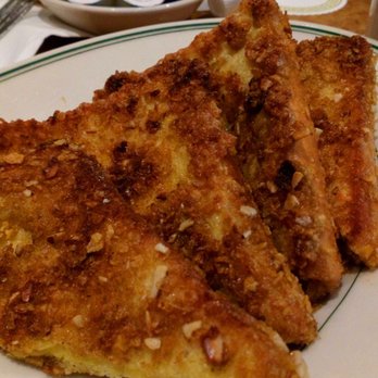 Village Square Cafe - Almond Crunch French toast goodness!! - Breakfast & Brunch Near Me - Redmond, Washington Village Square Cafe - Almond Crunch French toast goodness!! - Breakfast & Brunch Near Me - Redmond, Washington