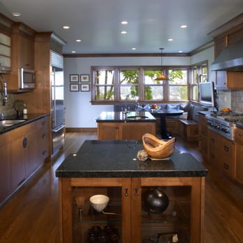 Capilano Builders - a kitchen with a center island - General Contractors Near Me - North Vancouver, British Columbia