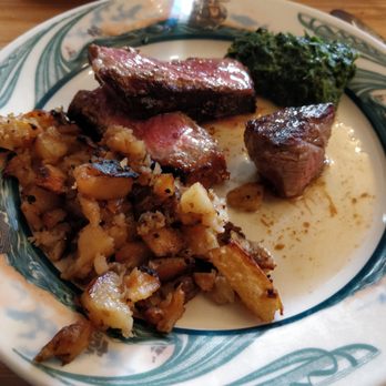 Peter Luger - Porterhouse Steak with creamed spinach, and roasted potatoes - Steakhouses Near Me - Brooklyn, New York