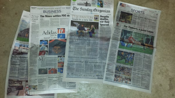 Photo of The Oregonian - Portland, OR, US. Another wet newspaper. Thank goodness they added an option to report a wet newspaper on their automated phone system