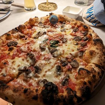 Song’e Napule Upper West - Cotto E Funghi pizza with prosciutto, mushrooms, and fresh basil - Pizza Near Me - New York, New York Song’e Napule Upper West - Cotto E Funghi pizza with prosciutto, mushrooms, and fresh basil - Pizza Near Me - New York, New York