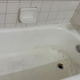 The tub and shower area looked a lot worse for wear The tub and shower area looked a lot worse for wear