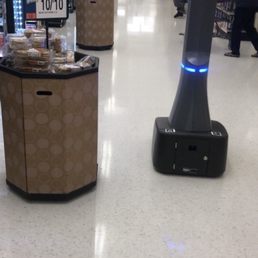 Robot. It creeped me out. It has tons of cameras on it. Robot. It creeped me out. It has tons of cameras on it.