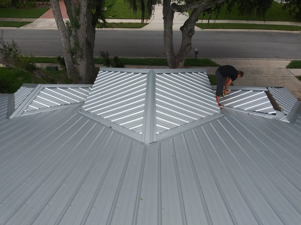 Slide of Ortiz Roofing Contractors