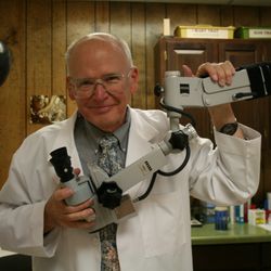 Bozeman Skin Clinic - Dr. Tkach examines patients with an operating microscope paying attention to small details.