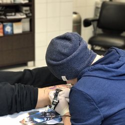 Tattoo & Piercing World
