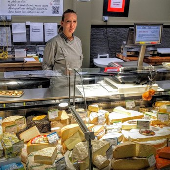 Provenc'Halles - Lovely Samantha in the cheese section.  She's English, and knows her cheeses. - Fruits & Veggies Near Me - Ussel, 19