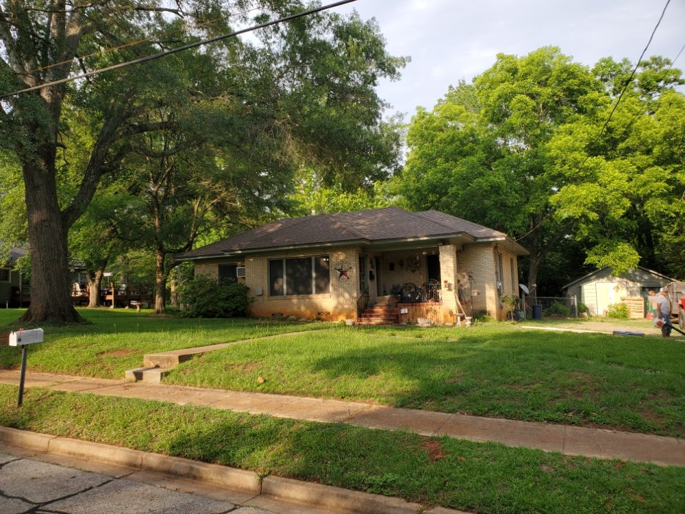 Slide of Bad Storm Roofing and Restoration