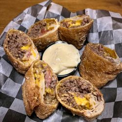 Father's Kitchen and Taphouse - Cheeseburger Rolls-Three handmade rolls stuffed with seasoned Beef, Bacon, and American cheese