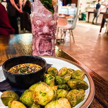 Machete - Fried potatoes with kimchi dip, with the electric moon cocktail - New American Near Me - Greensboro, North Carolina Machete - Fried potatoes with kimchi dip, with the electric moon cocktail - New American Near Me - Greensboro, North Carolina