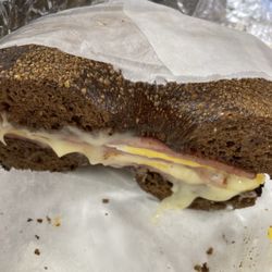 Hot Bagels and Deli - Pumpernickel bagel with Pork Roll Egg & Cheese