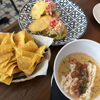 Bésame - Crawfish queso and pork arepas - Tapas/Small Plates Near Me - New Orleans, Louisiana Bésame - Crawfish queso and pork arepas - Tapas/Small Plates Near Me - New Orleans, Louisiana