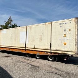 Just Ship It Logistics - Flatbeds are one of the best ways to move anything oversized or overweight. Another shipping container ready to roll out.