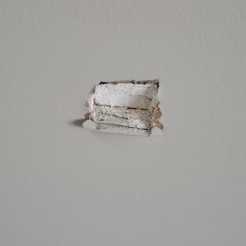 Moving Pros - Hole in the wall from a dropped headboard - Movers Near Me - Grain Valley, Missouri Moving Pros - Hole in the wall from a dropped headboard - Movers Near Me - Grain Valley, Missouri