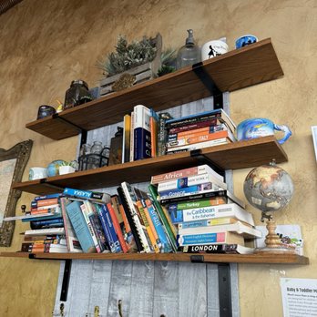 Nomad Cafe & Eatery - Bookshelf of travel books - Cafes Near Me - Ridgewood, New York Nomad Cafe & Eatery - Bookshelf of travel books - Cafes Near Me - Ridgewood, New York