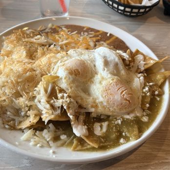 Dos Mundos Kitchen - Chilaquiles green sauce with eggs, beans and hash browns - Mexican Near Me - Upland, California Dos Mundos Kitchen - Chilaquiles green sauce with eggs, beans and hash browns - Mexican Near Me - Upland, California