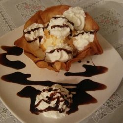 Puebla Mexican Restaurant - Nieve Frita $3.99 A shell with ice cream,whip cream and chocolate