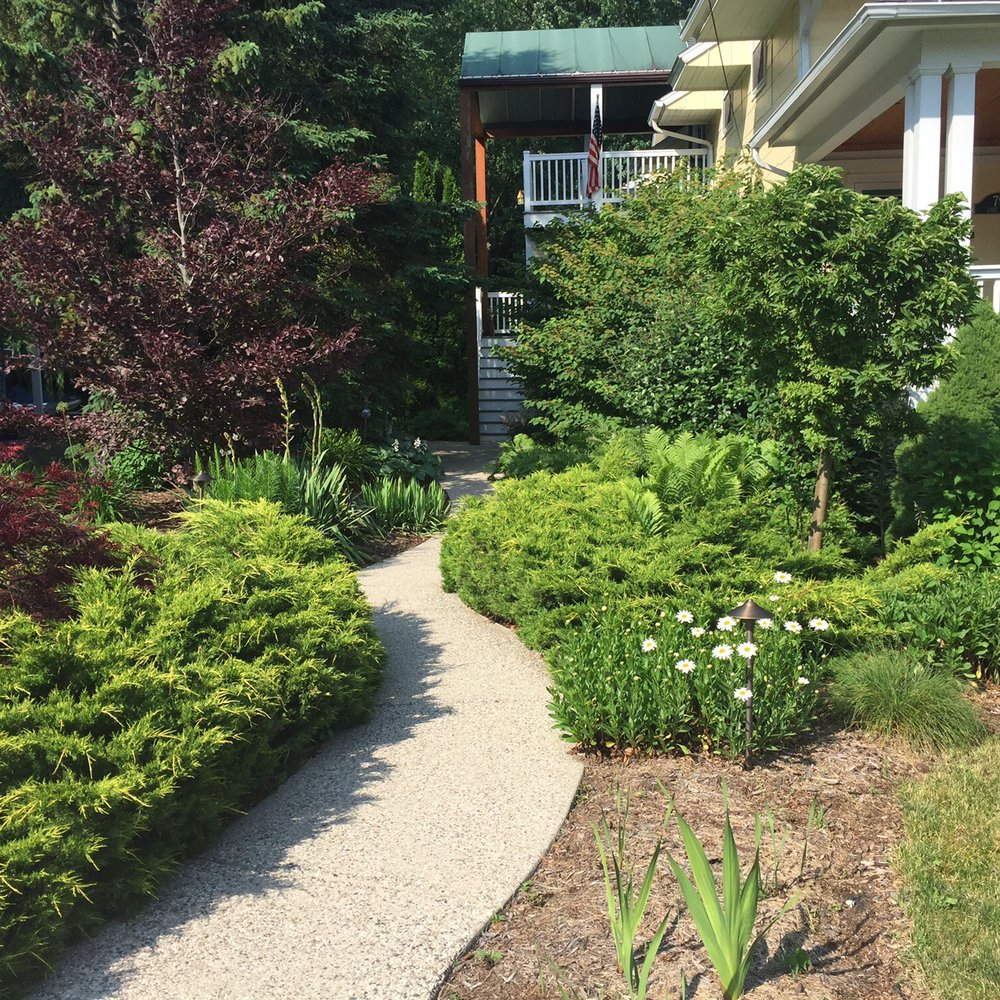 Lake Street Commons Lodging - Sidewalk leading to the private entrance to apartments - Vacation Rentals Near Me - Saugatuck, Michigan Lake Street Commons Lodging - Sidewalk leading to the private entrance to apartments - Vacation Rentals Near Me - Saugatuck, Michigan