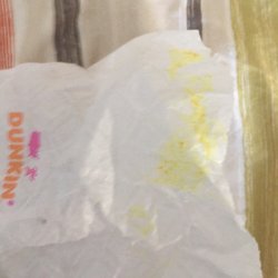 Dunkin' - Wrapper for my bagel which was covered in this yellow liquid??