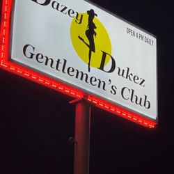 Dazey Dukez Gentleman’s Club - Street Sign seen from HWY 129 Alcoa, we open at 7pm - 3am, we are OPEN 7 days a week