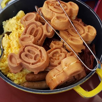 Chef Mickey's - Mickey Waffles in a family all-you-can-eat pan & Mickey pancake in the background - American Near Me - Lake Buena Vista, Florida