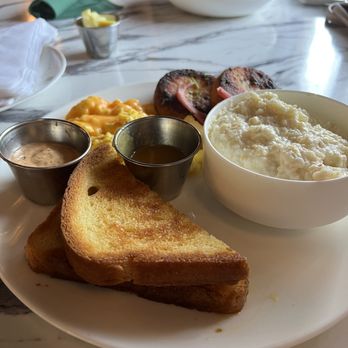 Breakfast At Barneys - Salmon cakes with scrambled eggs and grits - Breakfast & Brunch Near Me - Atlanta, Georgia Breakfast At Barneys - Salmon cakes with scrambled eggs and grits - Breakfast & Brunch Near Me - Atlanta, Georgia