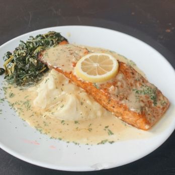 Sea Salt Seafood Lounge - Salmon entree with greens and mash potatoes - Seafood Near Me - Atlanta, Georgia Sea Salt Seafood Lounge - Salmon entree with greens and mash potatoes - Seafood Near Me - Atlanta, Georgia