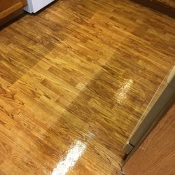 Patriot Carpet Cleaning - After cleaning this linoleum, it looks like a real wood floor.