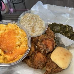 The Chicken Hut - Fried chicken plate with greens, rice and gravy, macaroni and cheese, and a roll
