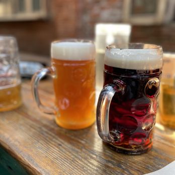 Radegast Hall and Biergarten - beer glasses on a table - Pubs Near Me - Brooklyn, New York