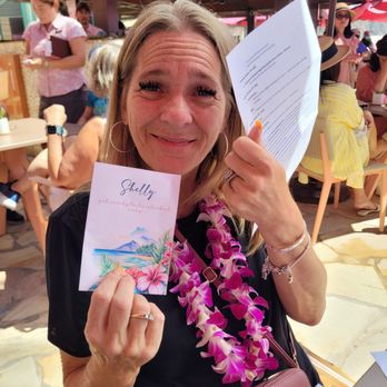 Mai Tai Bar - The "surprise" that Mark (our waiter)  gave to Shelly (trip to the Cook Islands) - Cocktail Bars Near Me - Honolulu, Hawaii