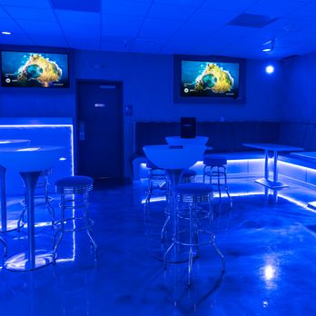 Elevation Lounge - a bar with blue lighting and bar stools - Lounges Near Me - Jacksonville, Florida Elevation Lounge - a bar with blue lighting and bar stools - Lounges Near Me - Jacksonville, Florida