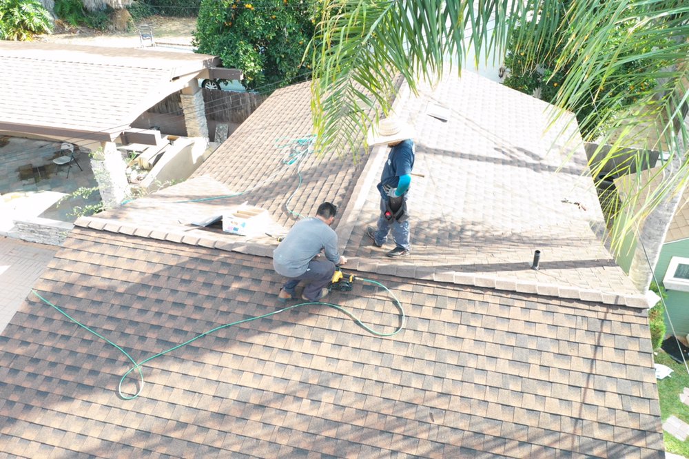 Slide of Economy Roofing & Construction