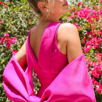 Camilyn Beth Studio - The Amelia Gown in Fuchsia with the bow wrap! Made in a luxe Satin material. - Women's Clothing Near Me - Sarasota, Florida Camilyn Beth Studio - The Amelia Gown in Fuchsia with the bow wrap! Made in a luxe Satin material. - Women's Clothing Near Me - Sarasota, Florida