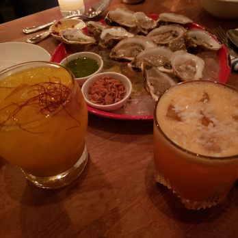 Fish Cheeks - Thai breaker and spicy mango accompanying oysters - Seafood Near Me - New York, New York Fish Cheeks - Thai breaker and spicy mango accompanying oysters - Seafood Near Me - New York, New York